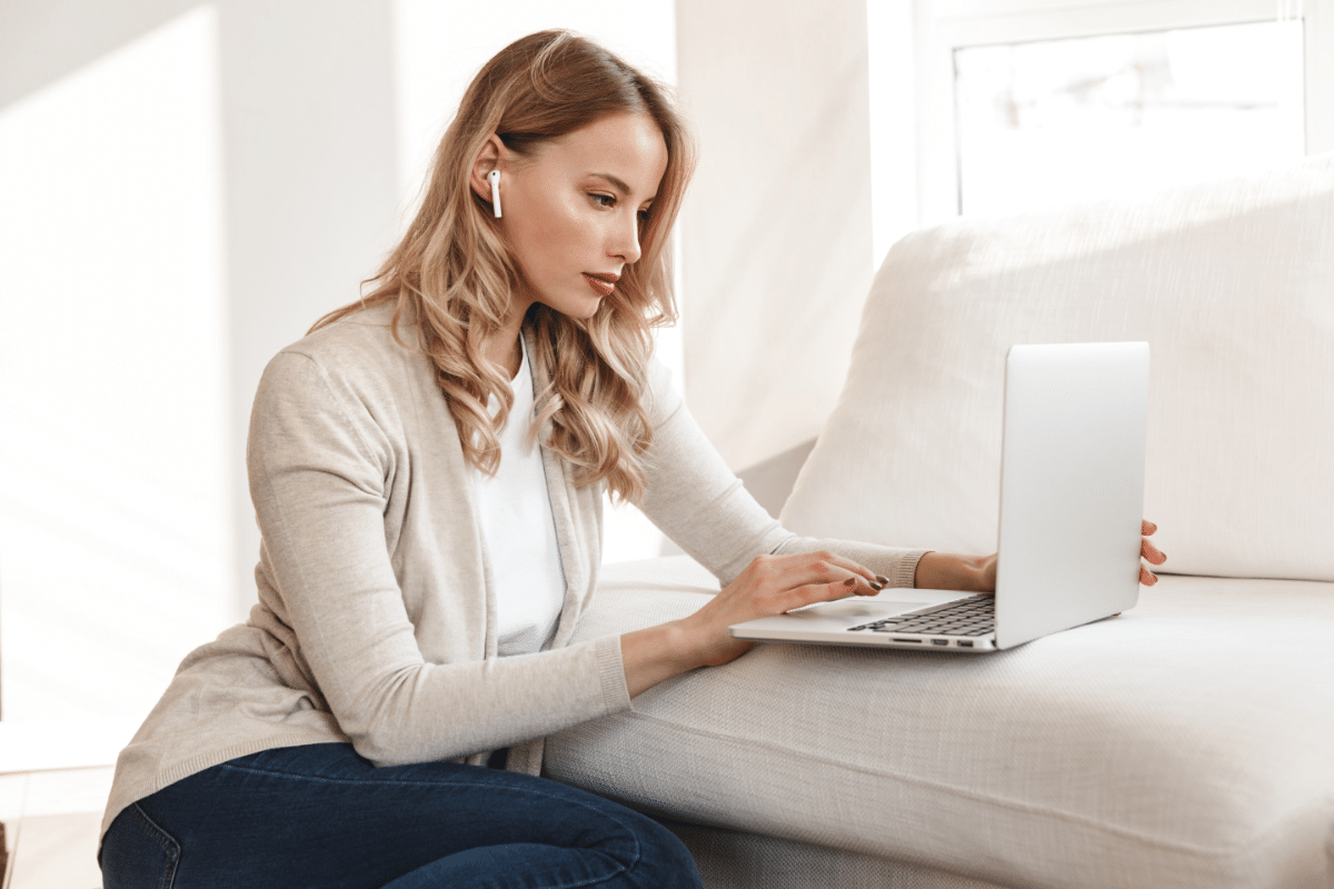 woman taking surveys on laptop